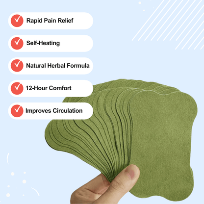 Hand holding a stack of green, leaf-shaped patches.