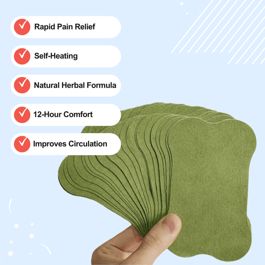 Hand holding a stack of green, leaf-shaped patches.